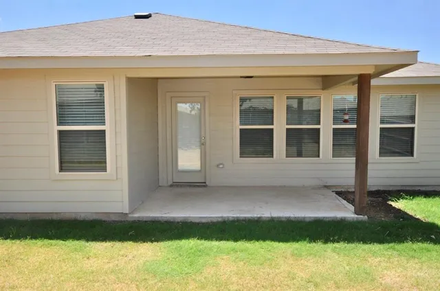 a house view with a garden space