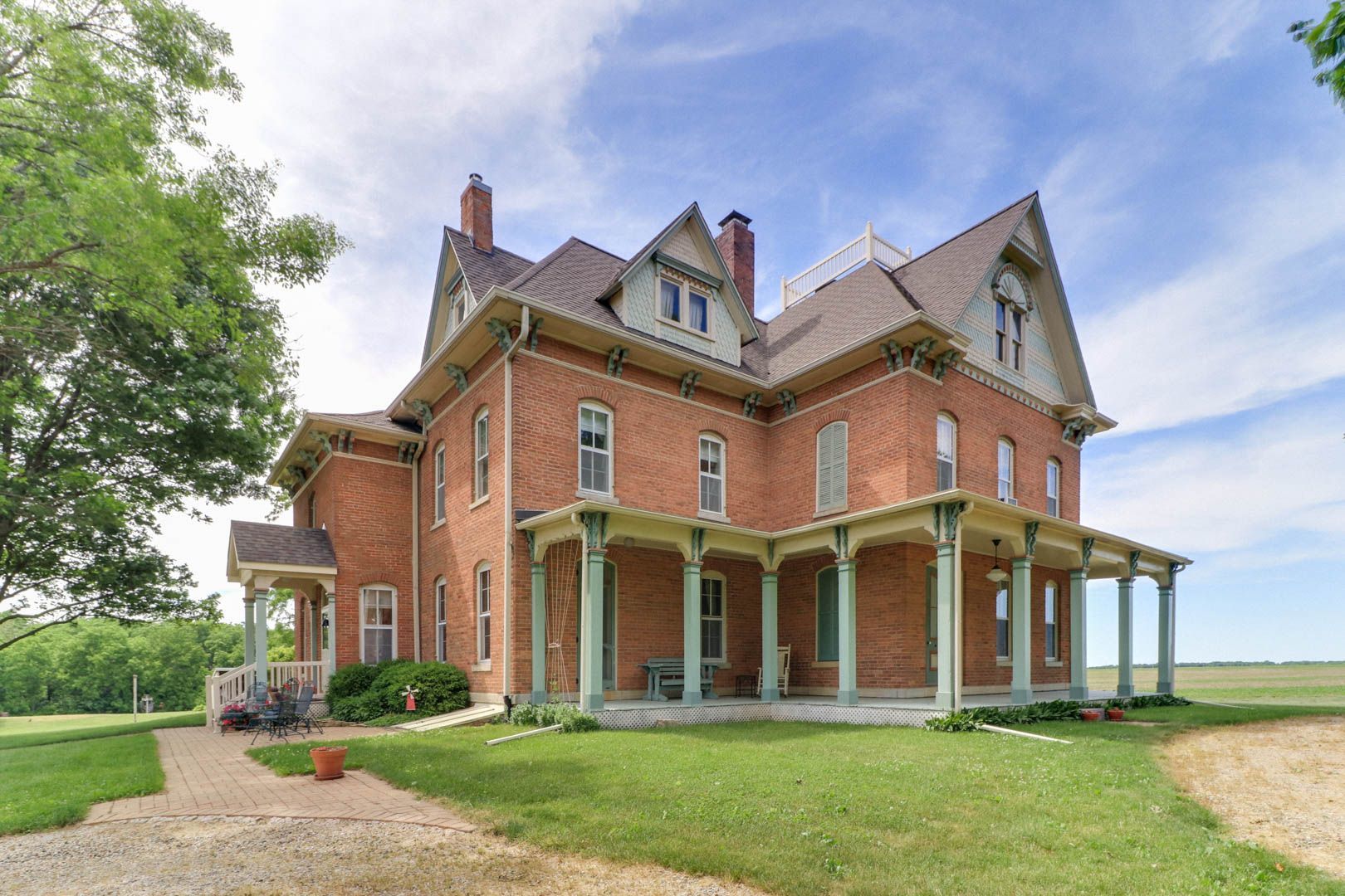 367 Horner Road Armington, IL 61721 - Photo 1 of 50 front view of a brick house with a yard