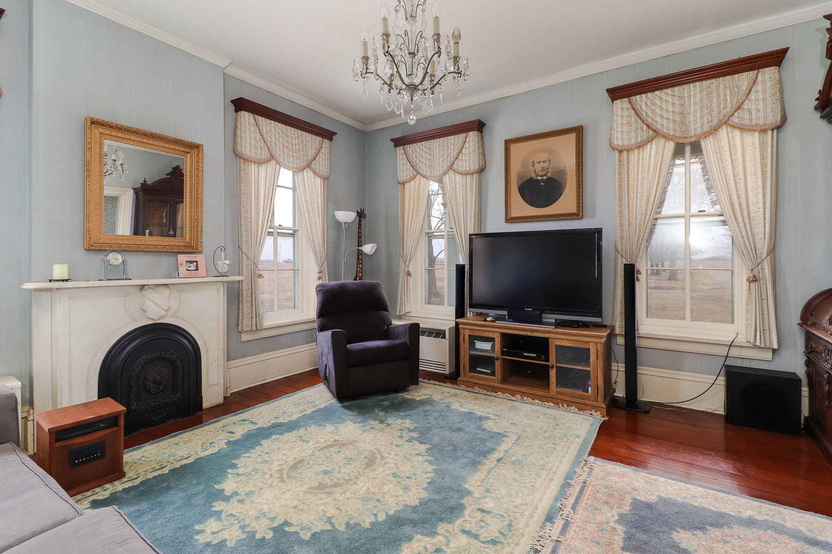 367 Horner Road Armington, IL 61721 - Photo 12 of 50 a living room with furniture and a flat screen tv