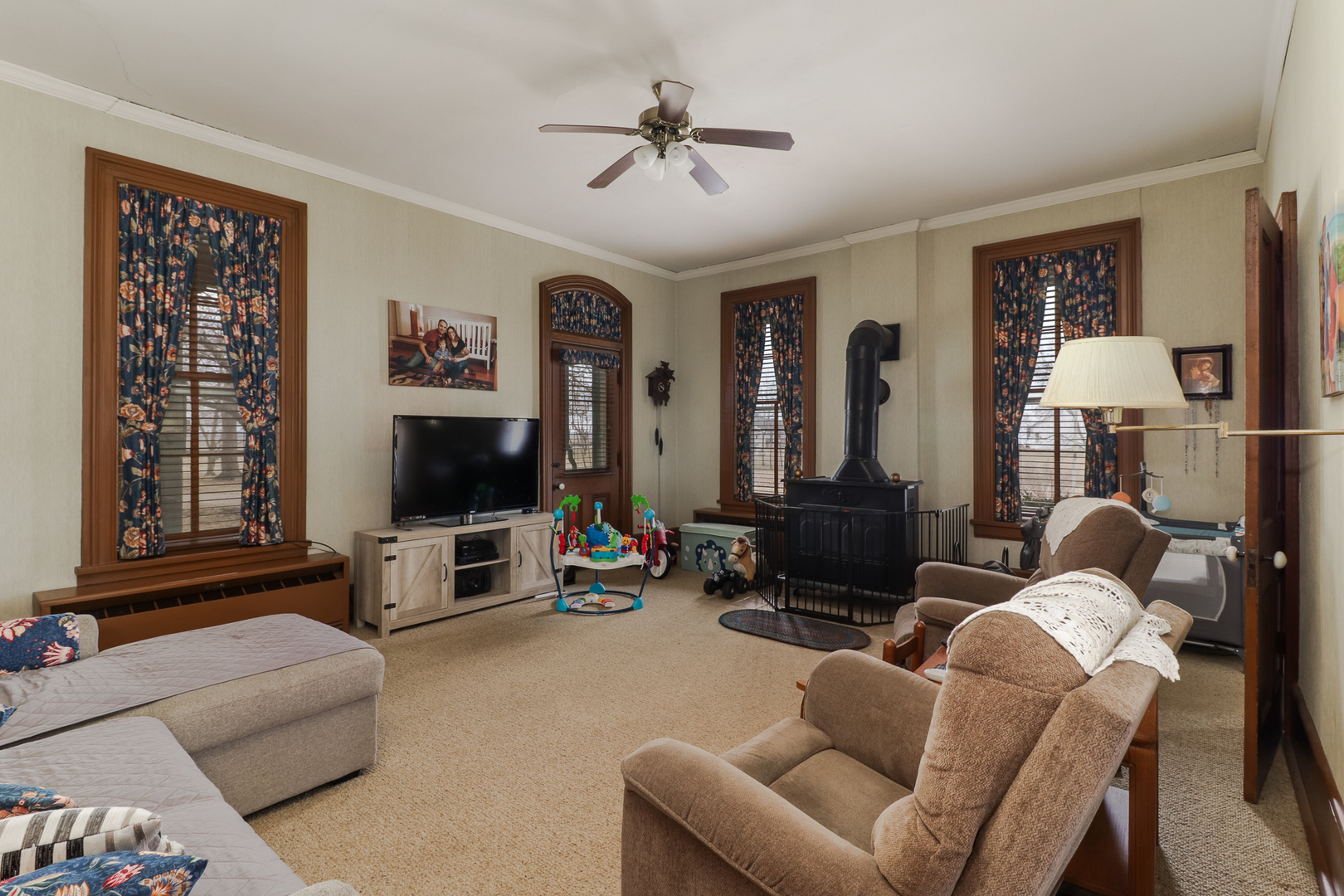 367 Horner Road Armington, IL 61721 - Photo 15 of 50 a living room with furniture ceiling fan and a window