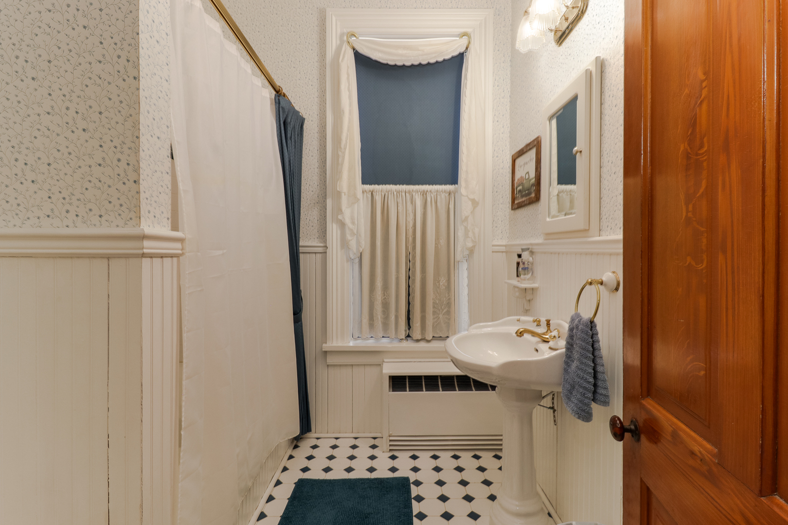 367 Horner Road Armington, IL 61721 - Photo 29 of 50 a bathroom with a window and toilet