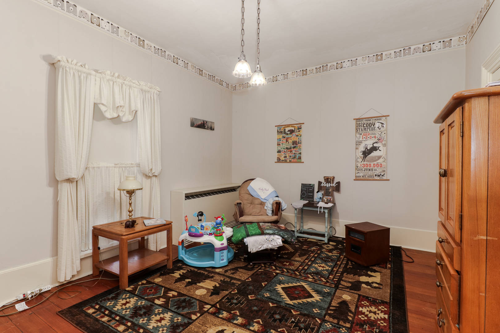 367 Horner Road Armington, IL 61721 - Photo 39 of 50 a living room with furniture and a chandelier