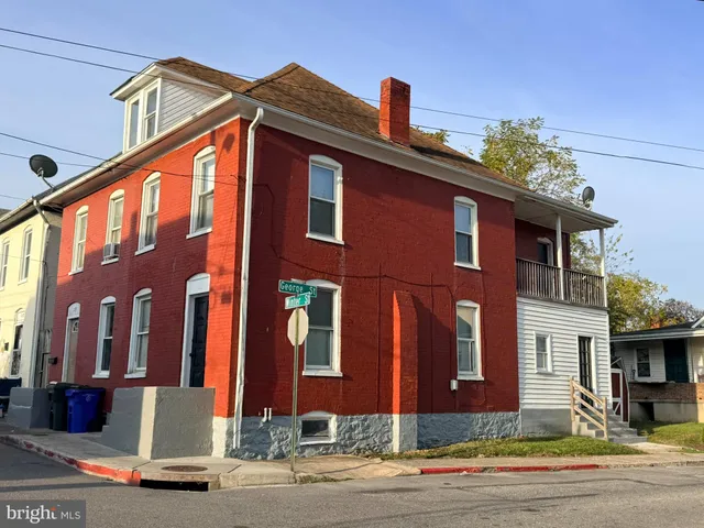 a front view of a building with street