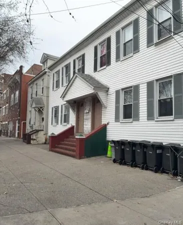 a front view of a house with a garage