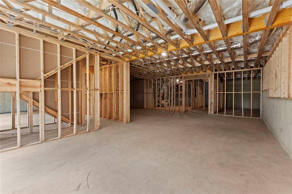 7066 Bells Way Fairburn, GA 30213 - Photo 60 of 64 a view of a room with wooden walls