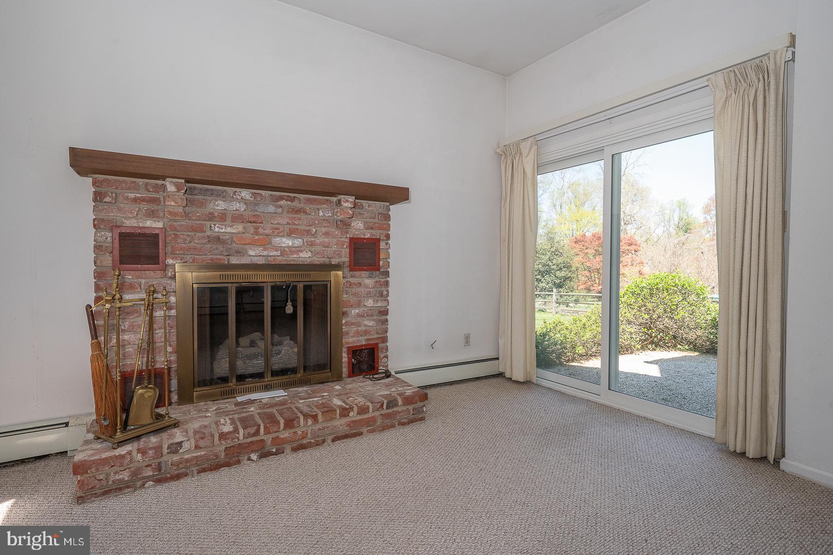 1200 Old Lancaster Road Berwyn, PA 19312 - Photo 12 of 23 Gas fireplace in family room