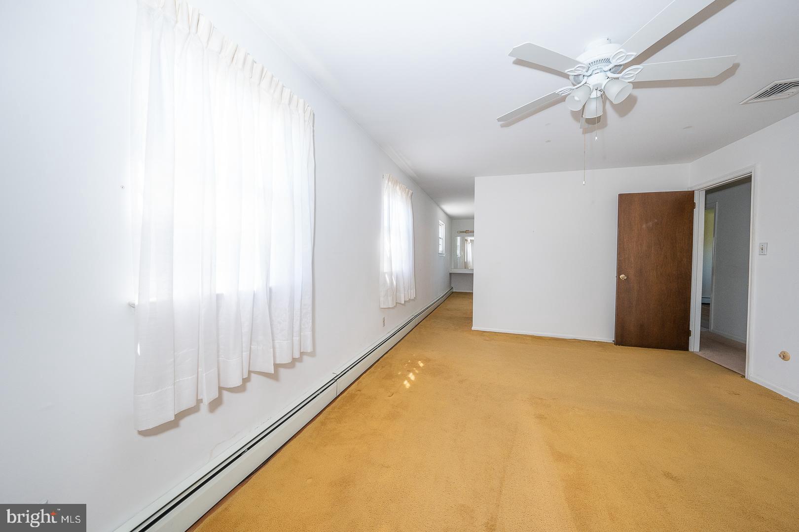 1200 Old Lancaster Road Berwyn, PA 19312 - Photo 14 of 23 Main bedroom to vanity w/hardwoods