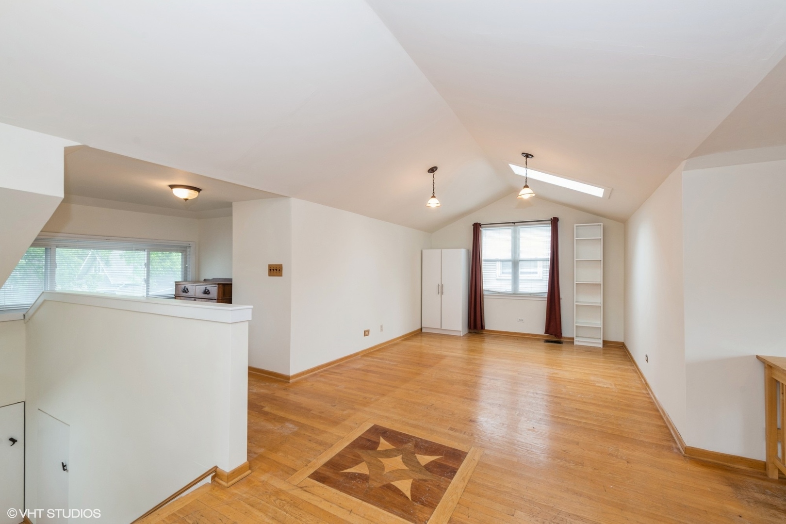 435 Jackson Boulevard Forest Park, IL 60130 - Photo 16 of 19 a view of an empty room with window and wooden floor