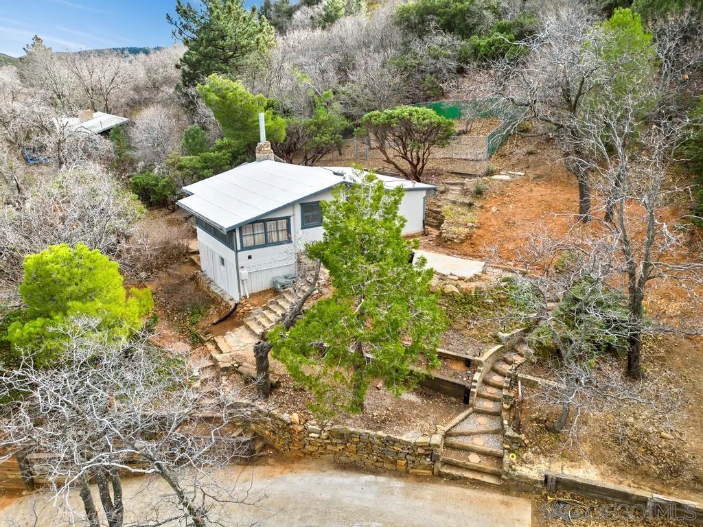 813 Pine Cone Drive Julian, CA 92036 - Photo 2 of 39 a view of a house with a yard