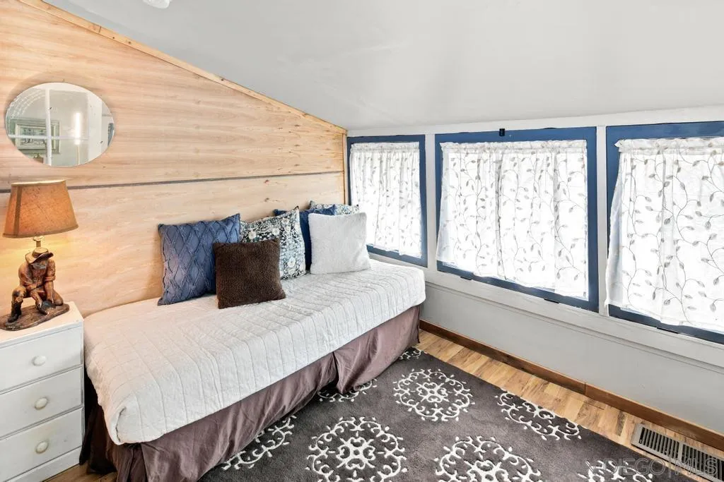 813 Pine Cone Drive Julian, CA 92036 - Photo 21 of 39 a bedroom with bed and window