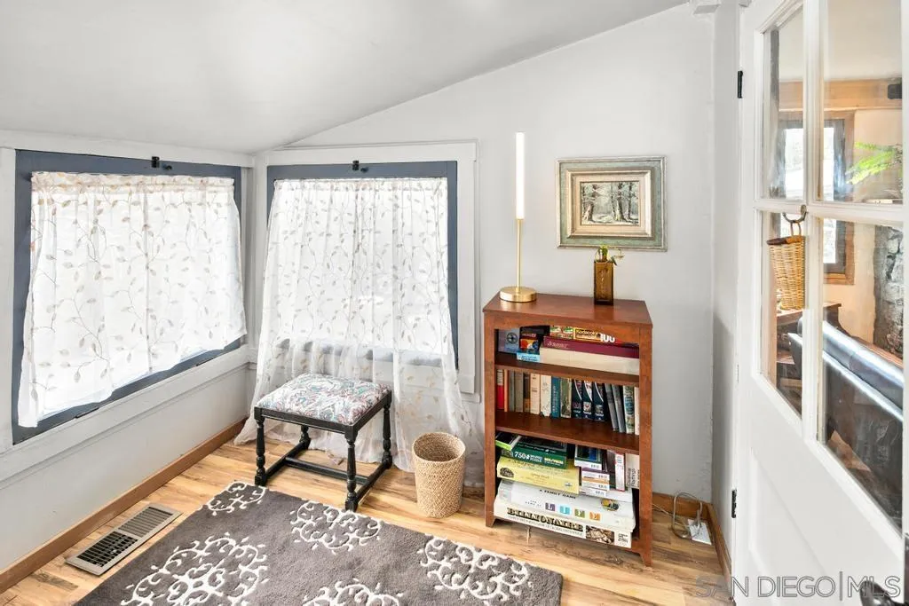 813 Pine Cone Drive Julian, CA 92036 - Photo 22 of 39 a living room with furniture and a window