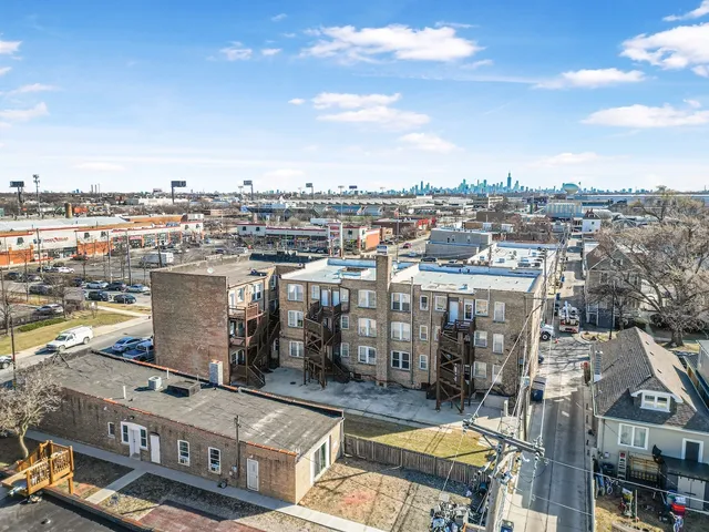 a view of a city with tall buildings