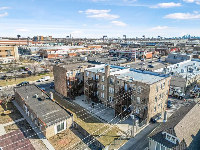 a front view of a building with large glass windows