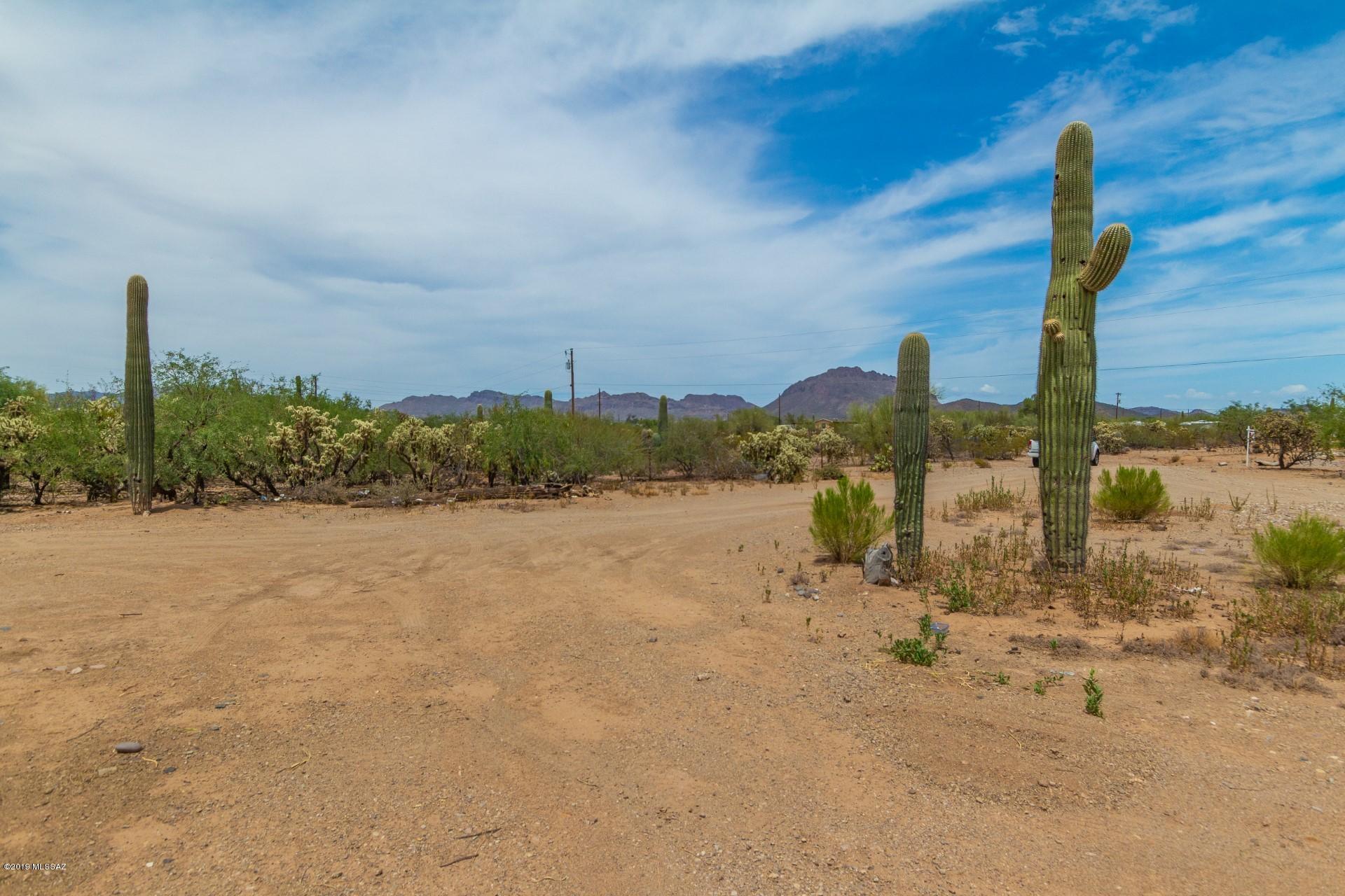 8945 West Bopp Road Tucson, AZ 85735 - Photo 3 of 21 a view of a lake with a city