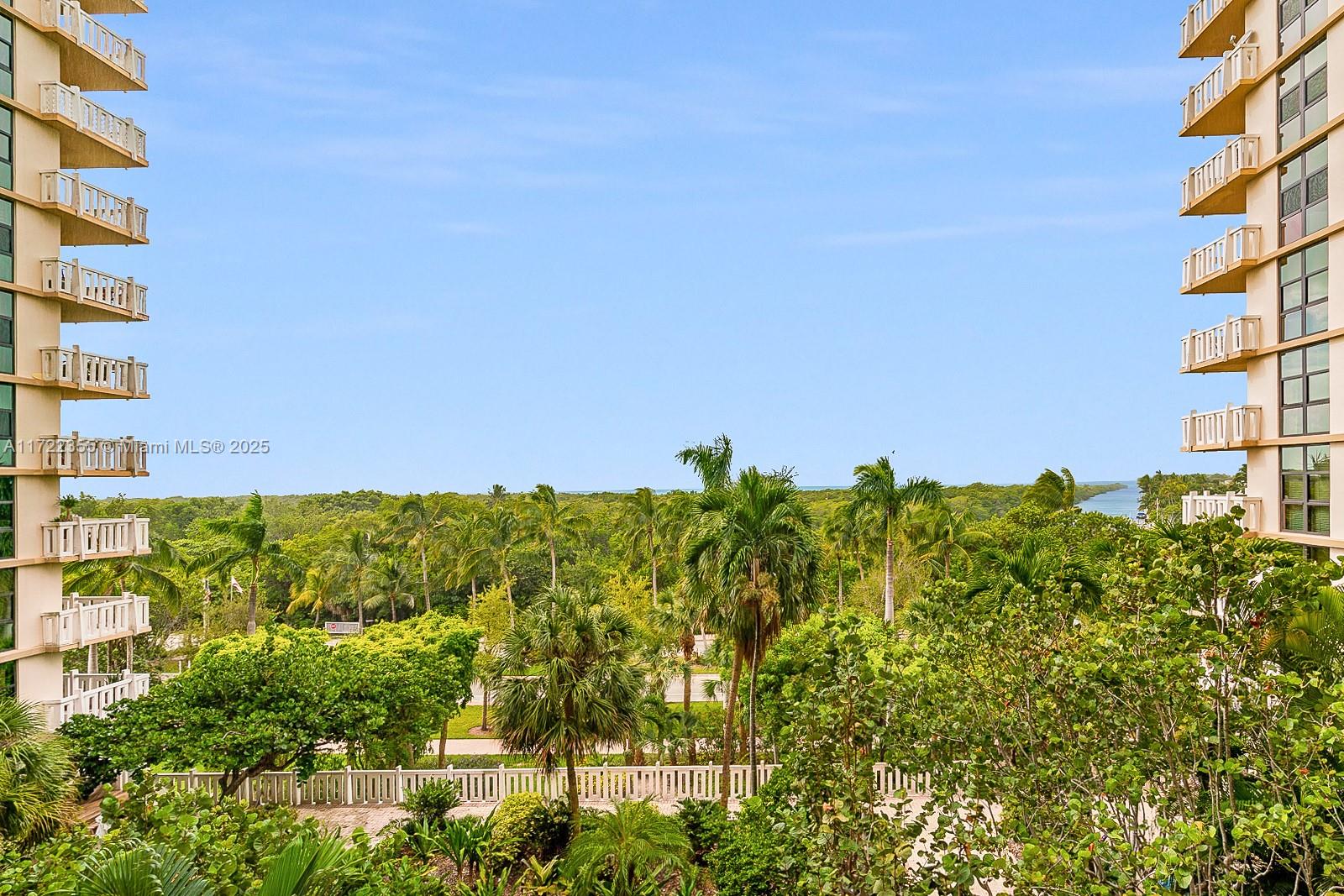 1121 Crandon Boulevard, Unit E405 Key Biscayne, FL 33149 - Photo 18 of 32 a view of a multi story building