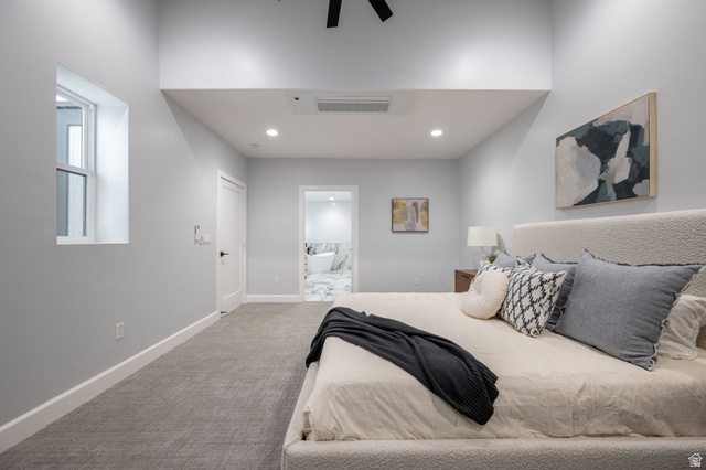 476 Spring Drive Toquerville, UT 84774 - Photo 43 of 95 Bedroom featuring light carpet, ensuite bath, a ceiling fan, and recessed lighting
