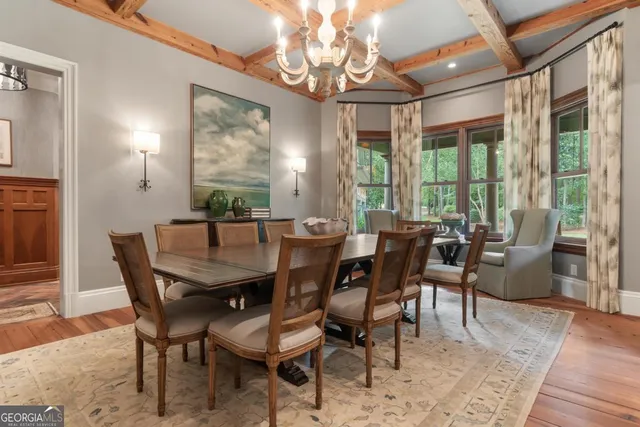 a bathroom with a sink a mirror and a toilet