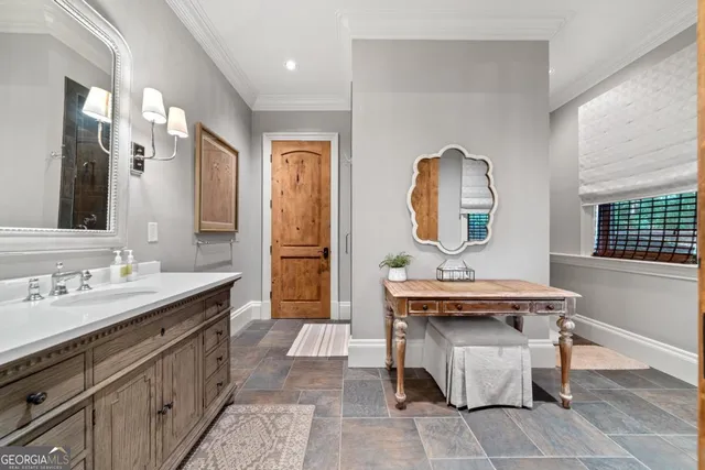 a view of a street with a tree in the background