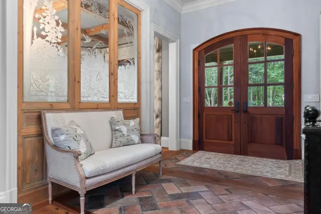 a view of living room with furniture and a fireplace