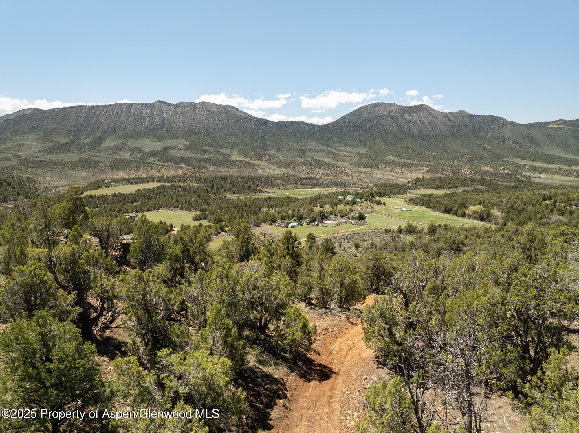 Tbd Grass Valley Road Rifle, CO 81650 - Photo 6 of 24 a view of a mountain range with lush green forest