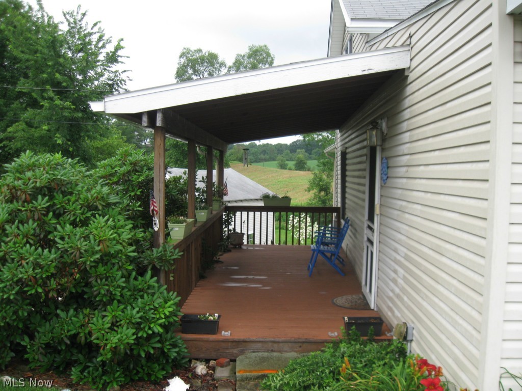 3963 State Road Medina, OH 44256 - Photo 8 of 25 Front porch with covering overlooks beautiful front yard.