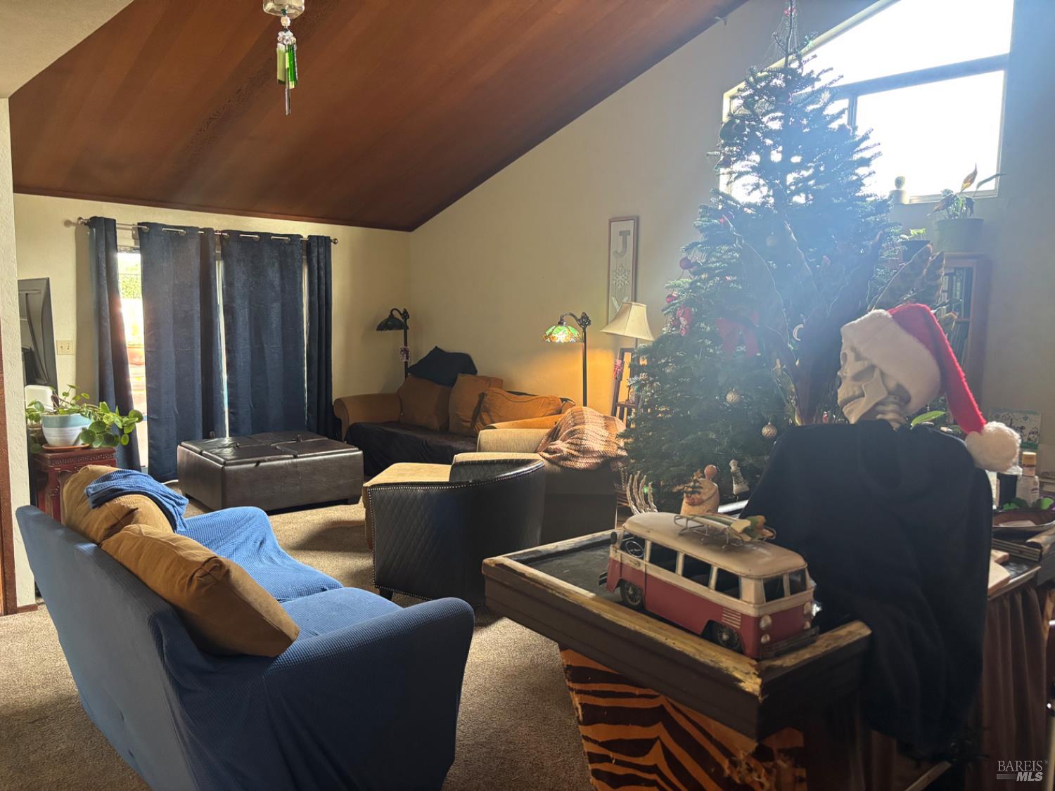 1830 Mission Boulevard Santa Rosa, CA 95409 - Photo 6 of 17 a living room with furniture and chandelier