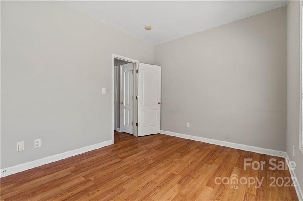 12320 Cross Meadow Road Huntersville, NC 28078 - Photo 11 of 17 a view of an empty room with wooden floor