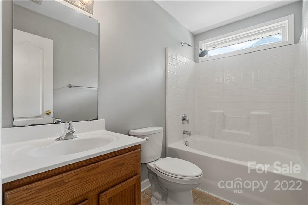 12320 Cross Meadow Road Huntersville, NC 28078 - Photo 14 of 17 a bathroom with a sink a toilet and shower