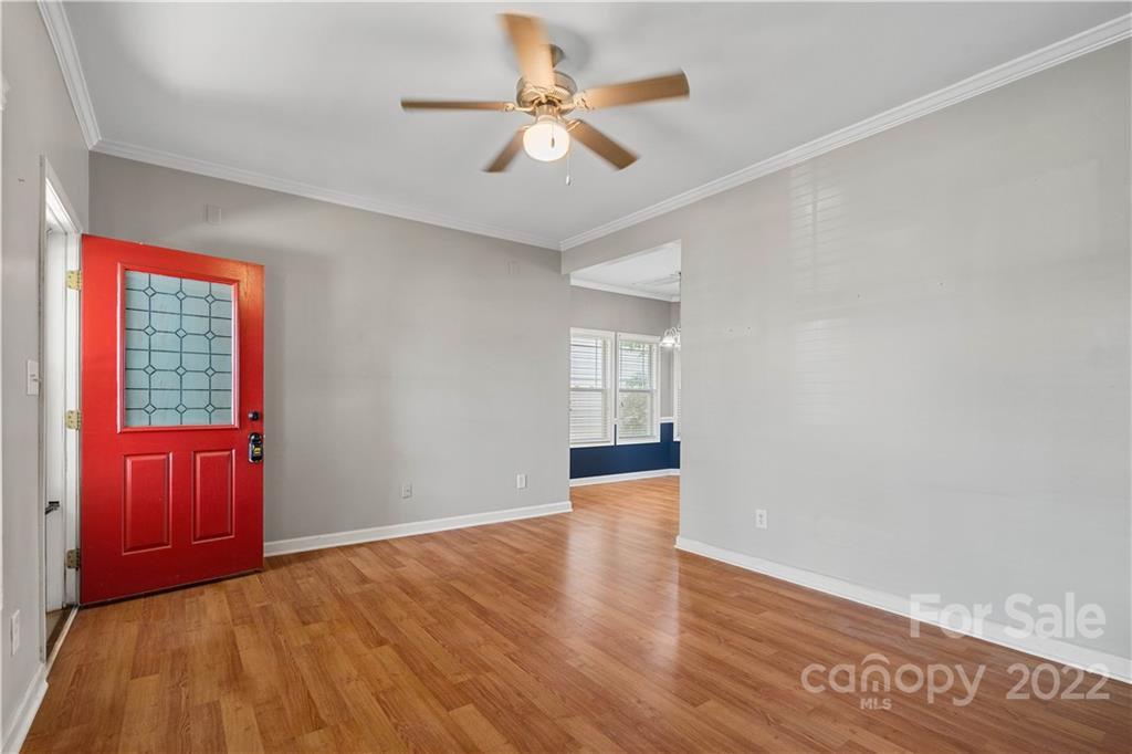 12320 Cross Meadow Road Huntersville, NC 28078 - Photo 4 of 17 wooden floor in an empty room with a window