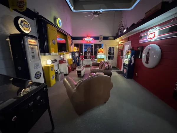 a garage with table and chairs