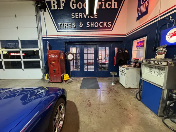 a view of a garage with wooden floor