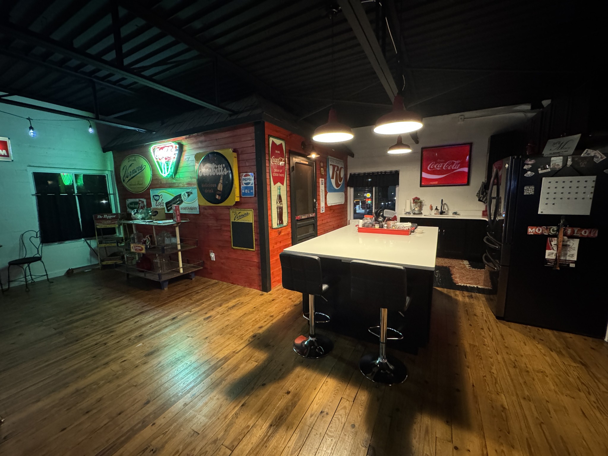 808 North 1st Street Pulaski, TN 38478 - Photo 44 of 77 a kitchen with a table chairs and a wooden floor