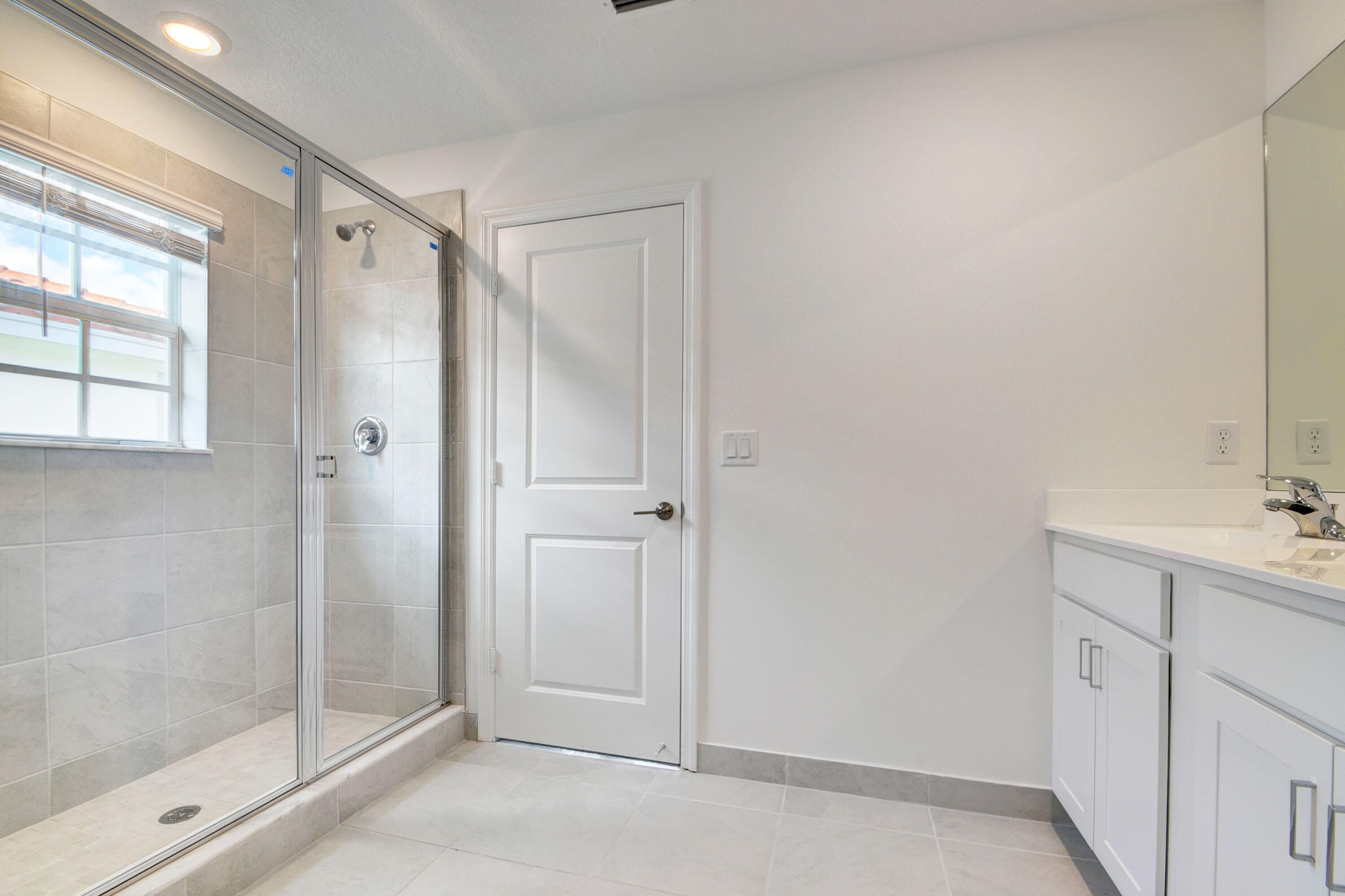 6875 Broadwater Ln Lake Lake Worth, FL 33467 - Photo 13 of 20 a bathroom with a shower and a sink