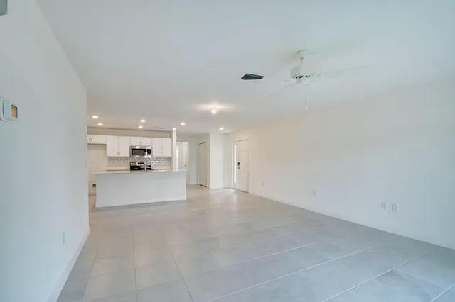 a view of kitchen with a sink