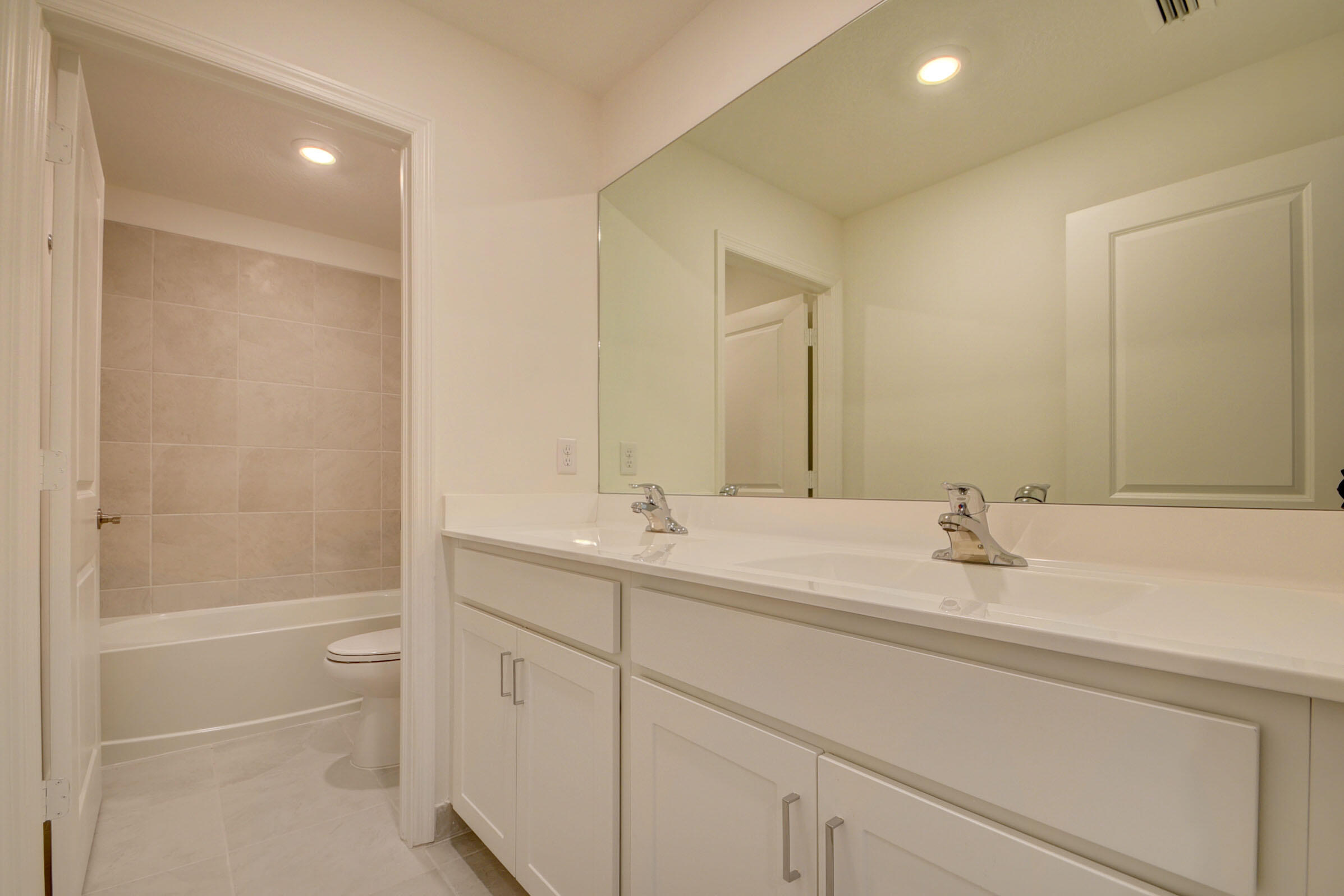 6875 Broadwater Ln Lake Lake Worth, FL 33467 - Photo 19 of 20 a bathroom with a sink and a mirror