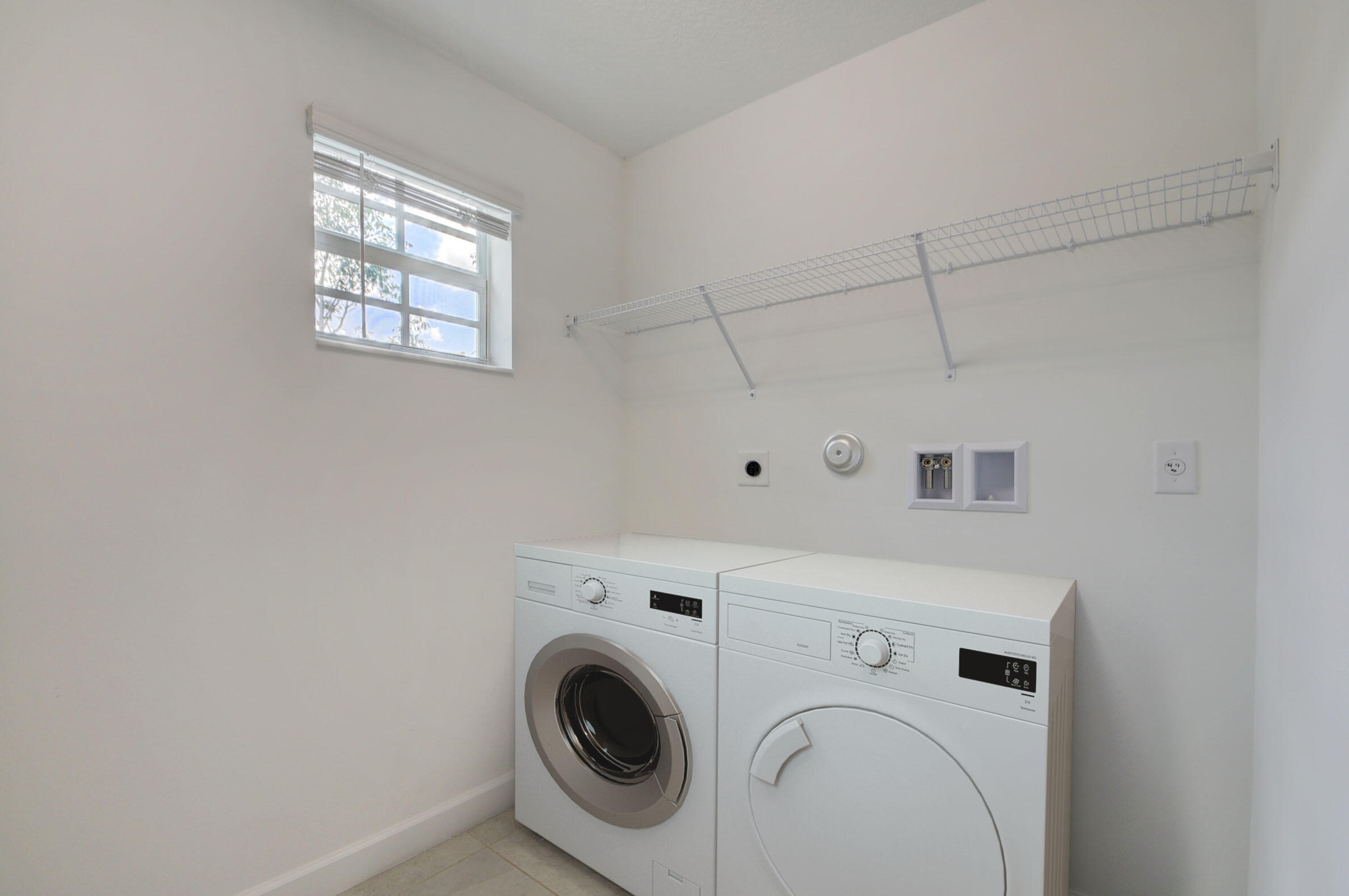 6875 Broadwater Ln Lake Lake Worth, FL 33467 - Photo 20 of 20 a utility room with dryer and washer