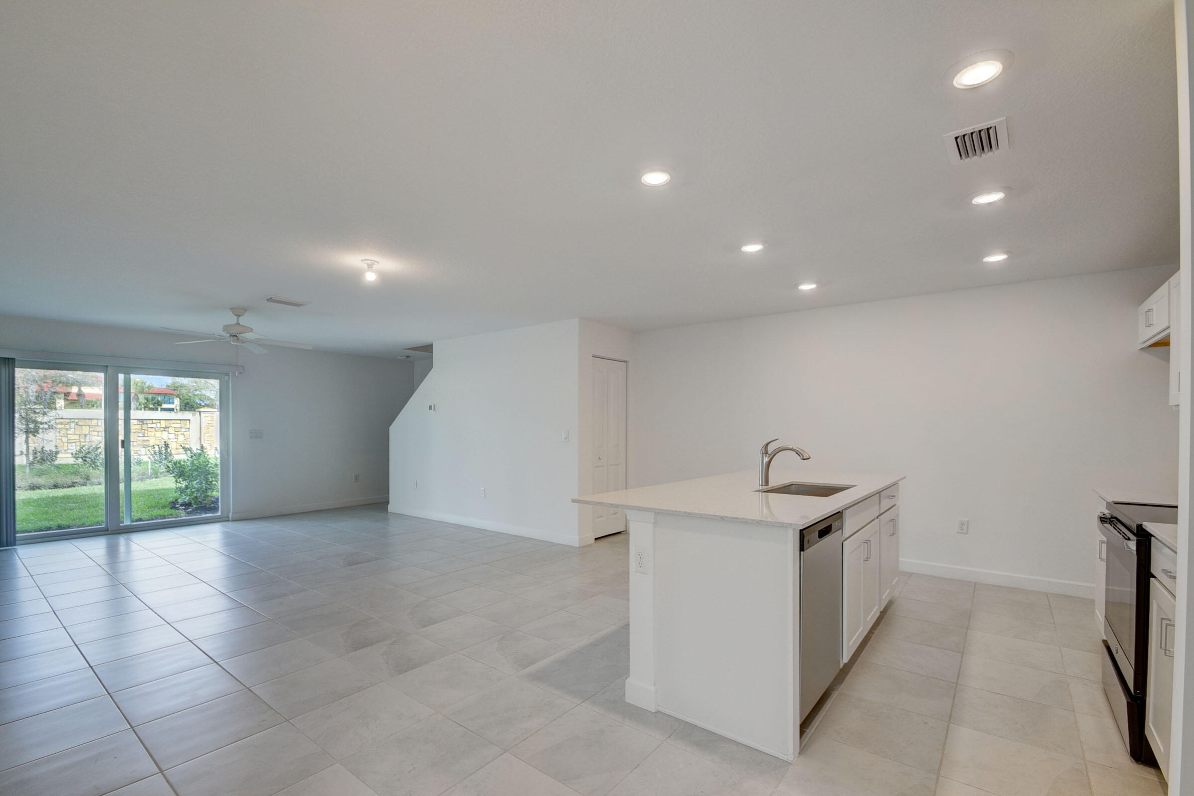6875 Broadwater Ln Lake Lake Worth, FL 33467 - Photo 6 of 20 a view of an empty room with a window