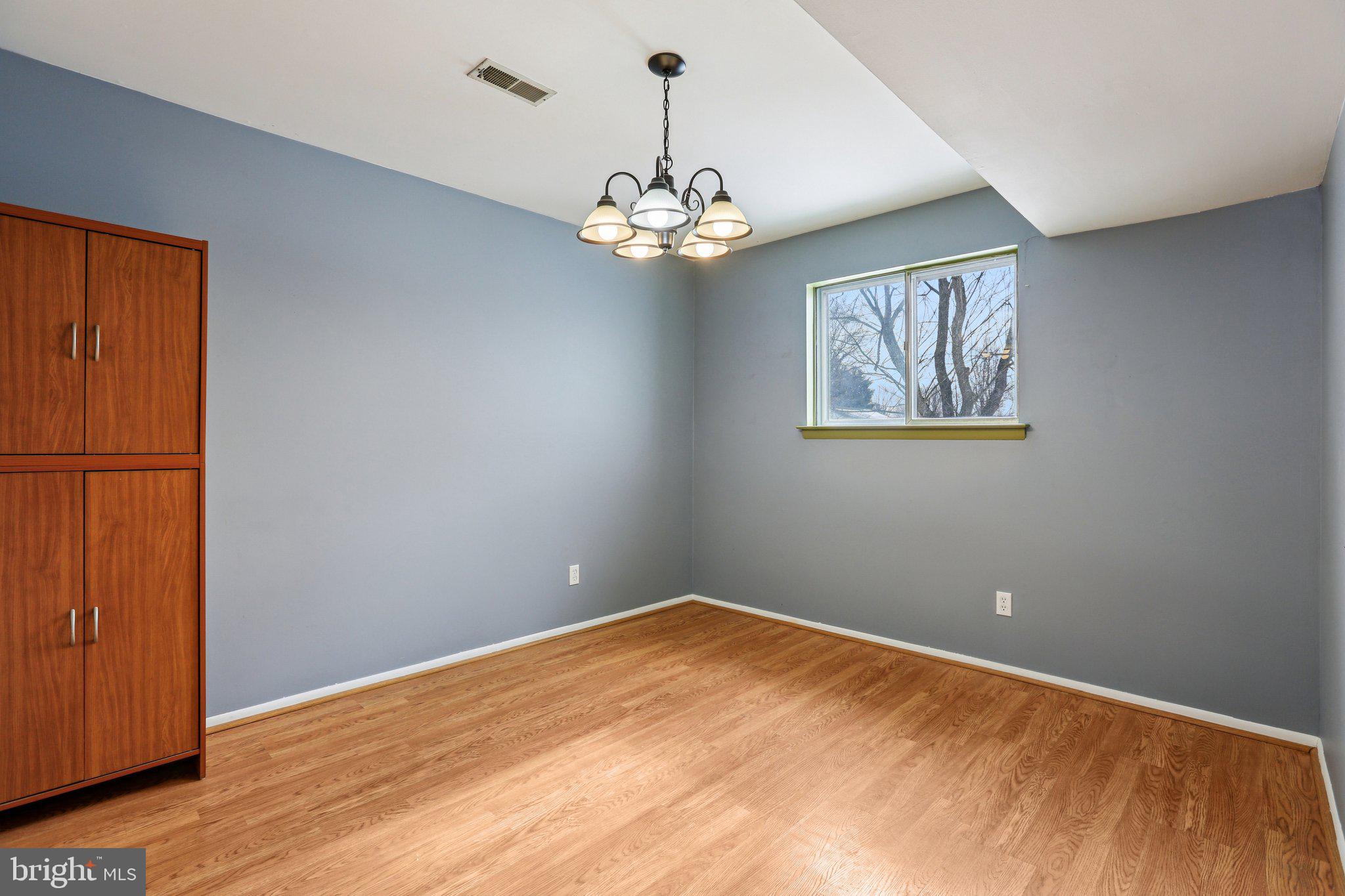 117 West Village Road Elkton, MD 21921 - Photo 11 of 37 a view of empty room with wooden floor