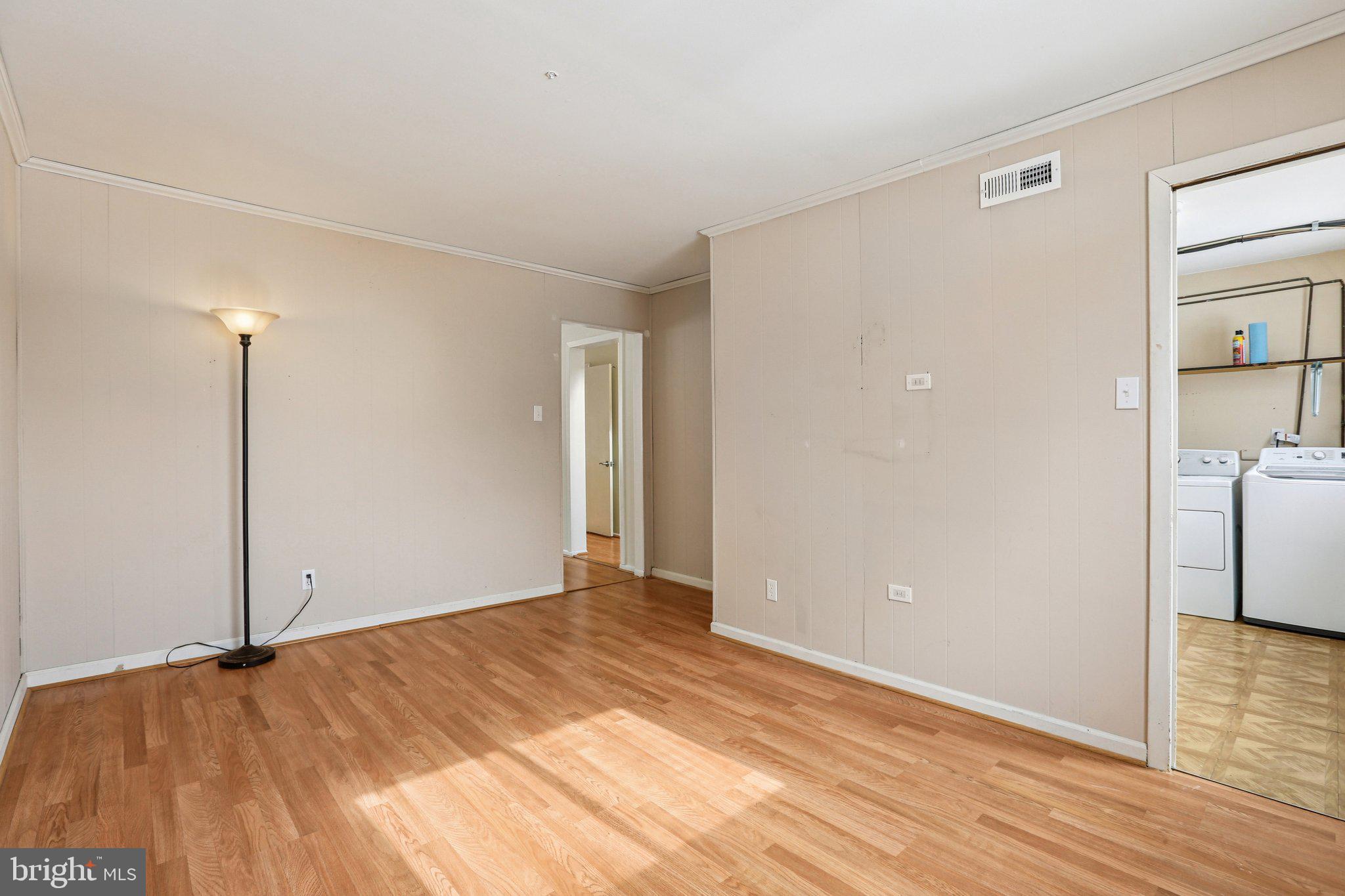 117 West Village Road Elkton, MD 21921 - Photo 14 of 37 a view of an empty room with wooden floor