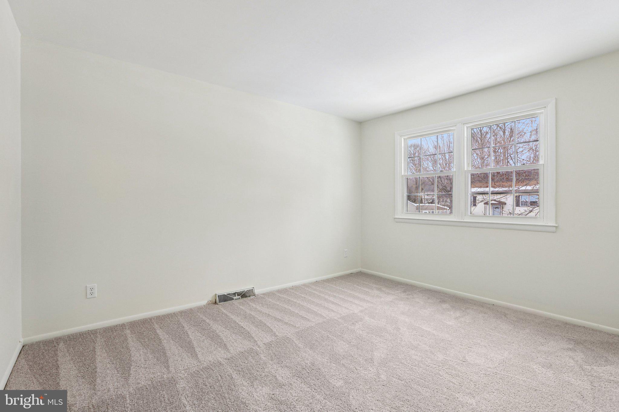 117 West Village Road Elkton, MD 21921 - Photo 19 of 37 an empty room with windows