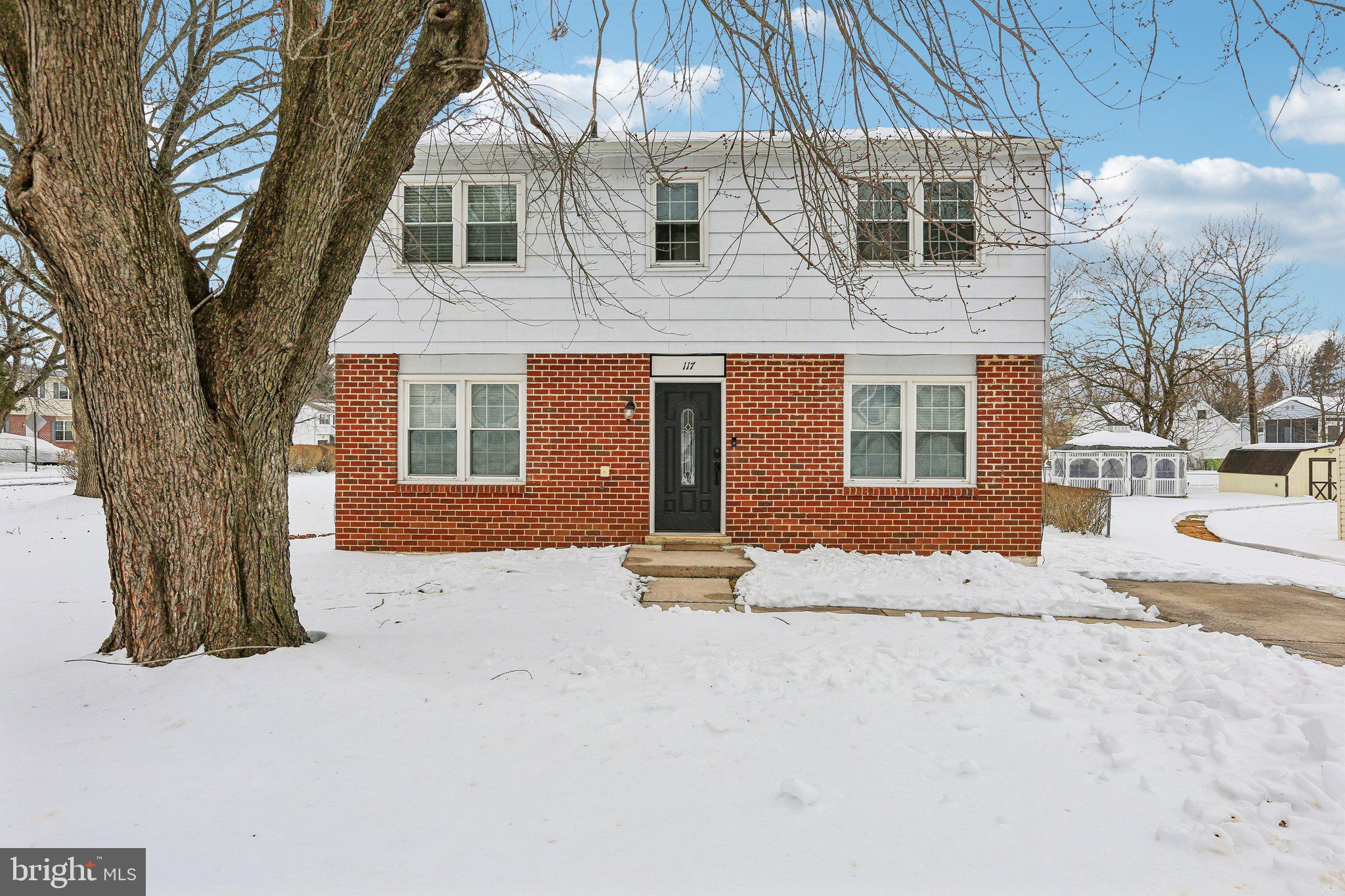 117 West Village Road Elkton, MD 21921 - Photo 2 of 37 a front view of a house with a yard