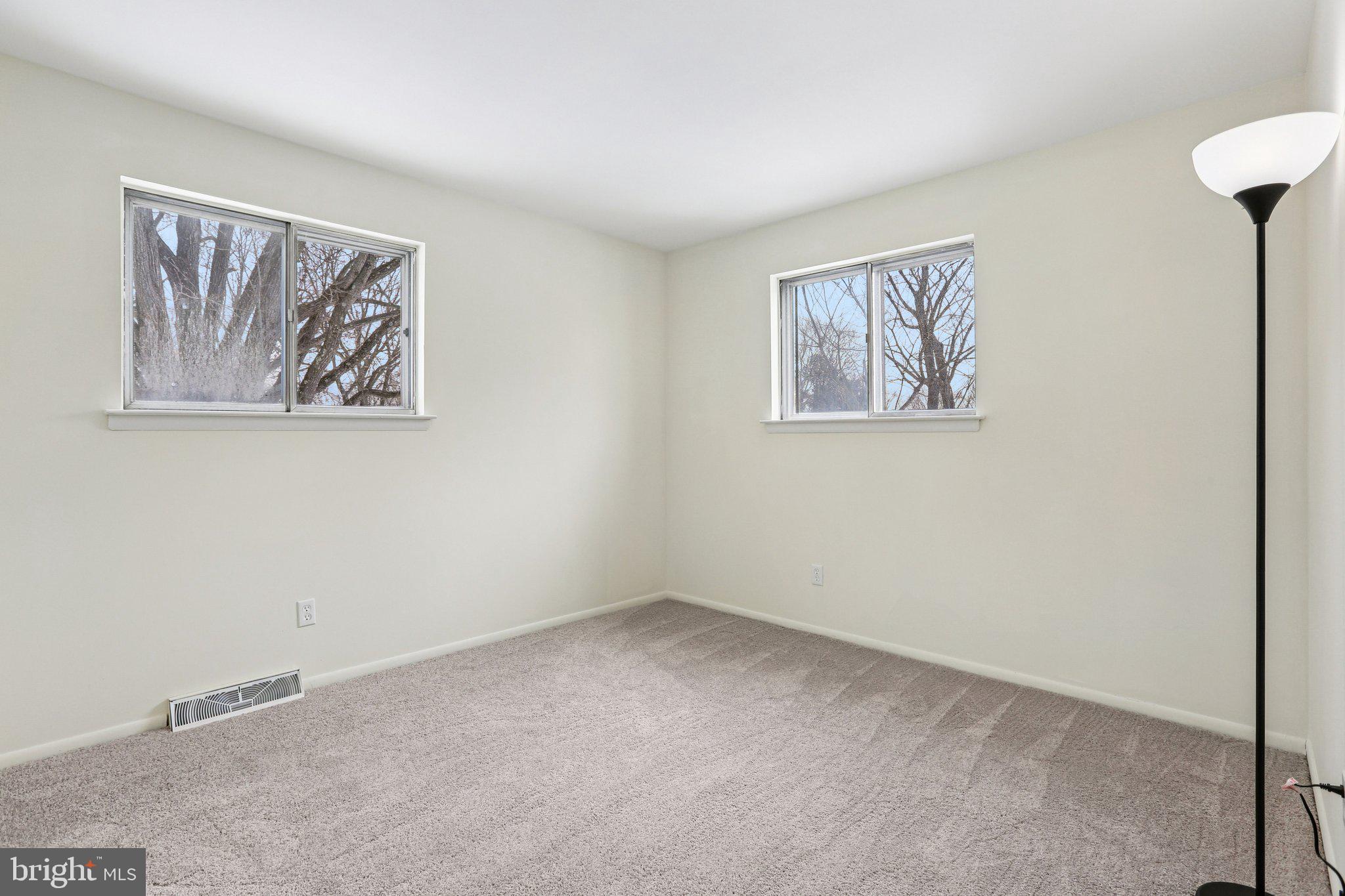 117 West Village Road Elkton, MD 21921 - Photo 25 of 37 a view of an empty room with a window