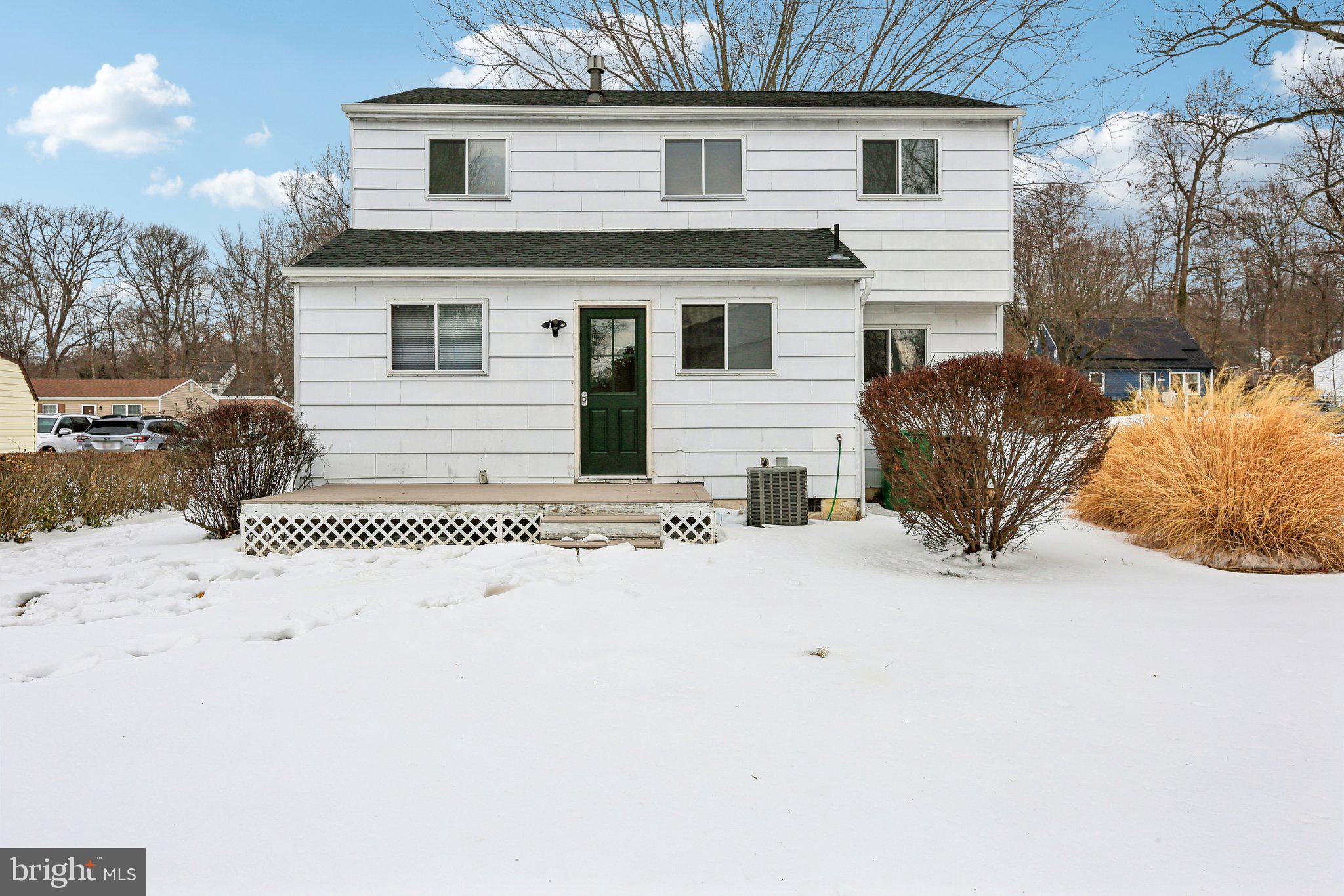 117 West Village Road Elkton, MD 21921 - Photo 29 of 37 a view of a house with a yard covered in snow