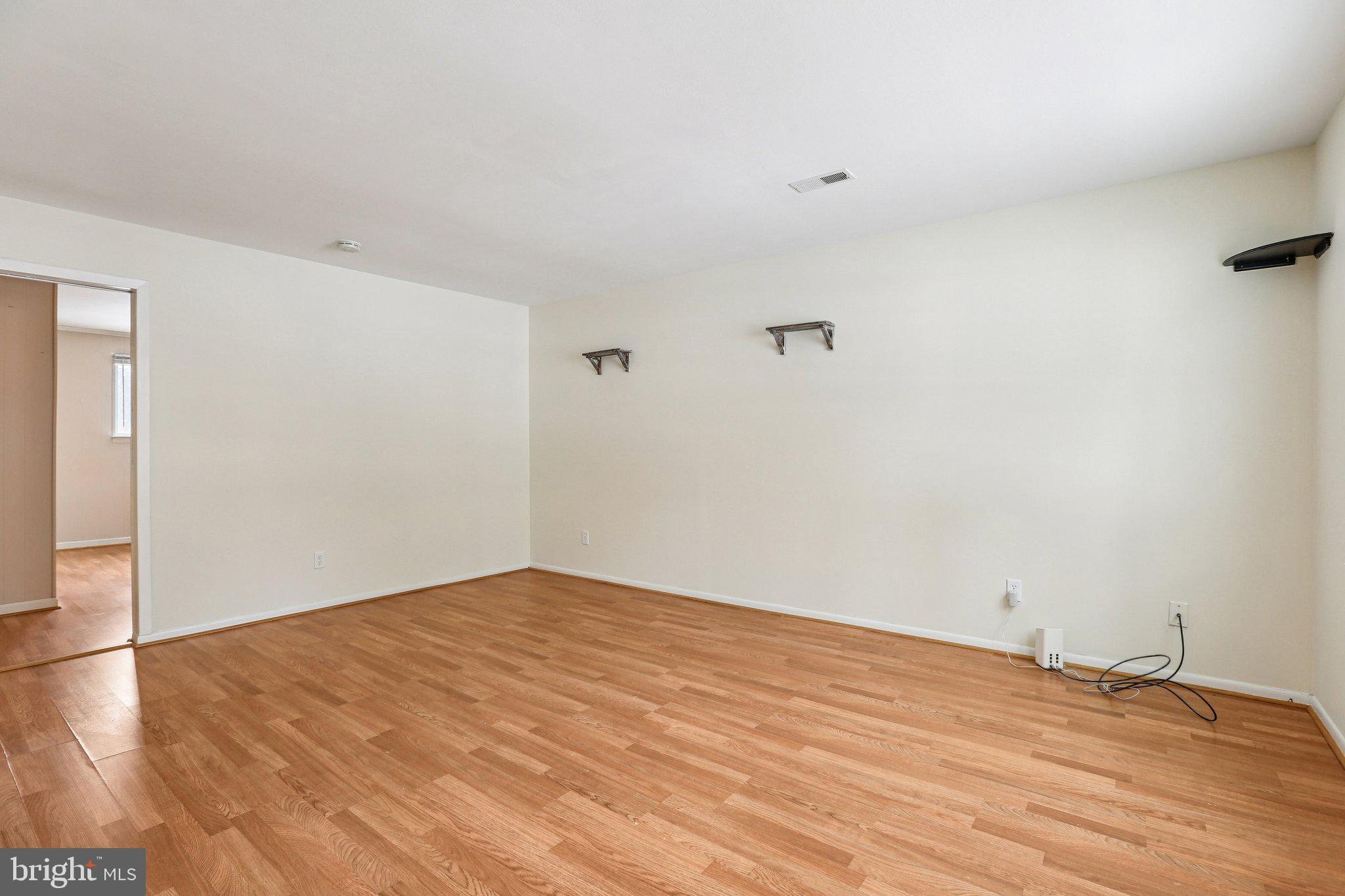 117 West Village Road Elkton, MD 21921 - Photo 6 of 37 a view of empty room with wooden floor