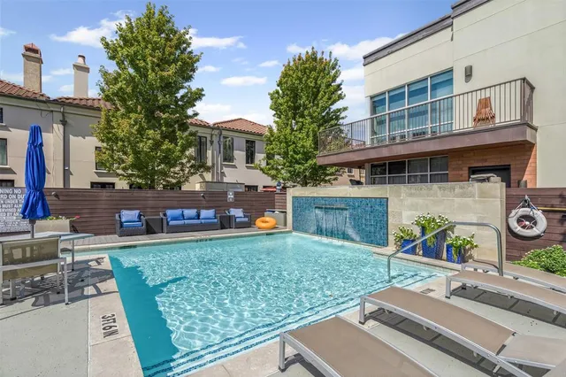 a view of a chairs and table in the patio