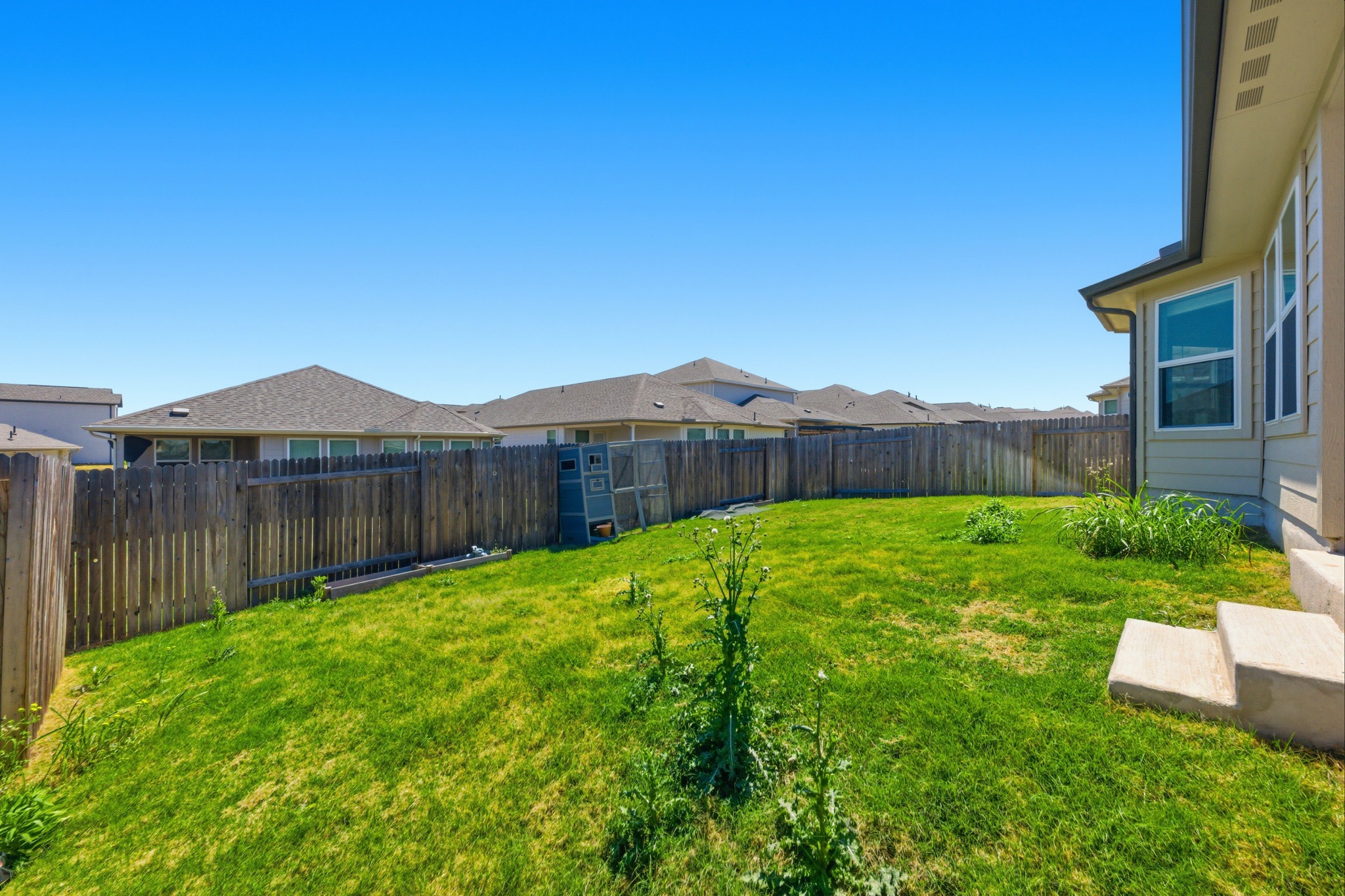 12309 Dairywork Road Buda, TX 78610 - Photo 23 of 29 View of fenced backyard