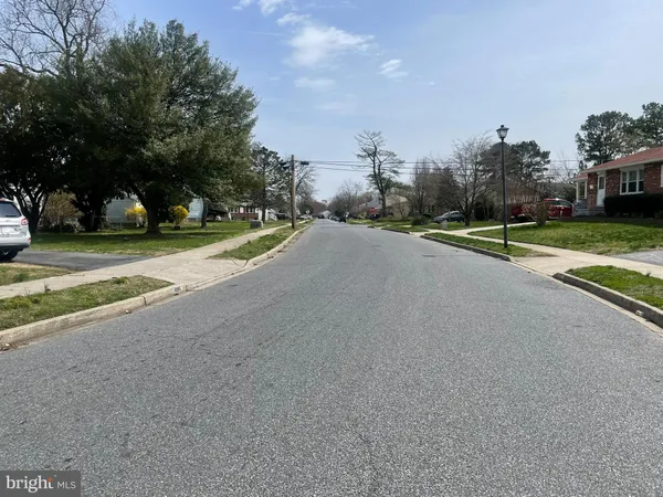 a view of a street with a houses