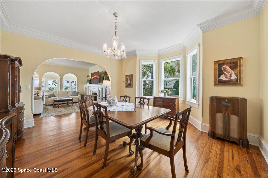 1110 Riverside Drive Titusville, FL 32780 - Photo 11 of 50 a view of a dining room with furniture window and wooden floor