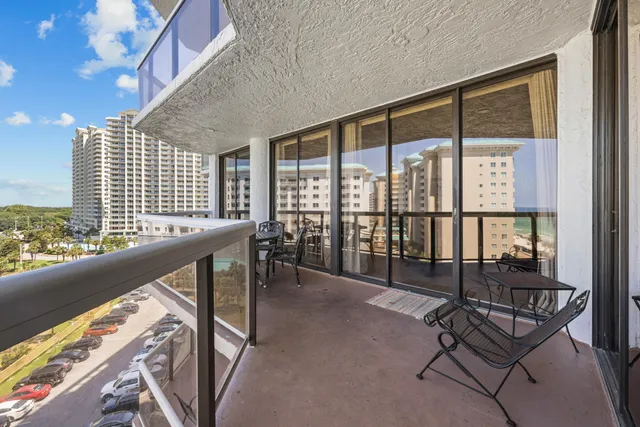 a view of a living room and dining room