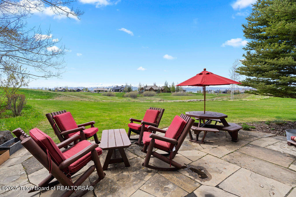 380 Cottongrass Road Driggs, ID 83422 - Photo 37 of 41 Lower Patio & 7th Hole